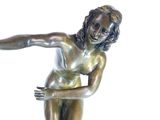 bronze statue of a woman holding a tennis racquet on a marble base