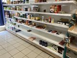 many shelves with food on them in a store