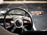 a close up of a steering wheel and dashboard of a car