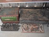 many different types of wooden boxes on the floor