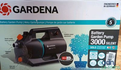 une boîte sur laquelle est représentée une pompe de jardin
