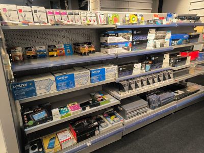 a lot of items on the shelves in the store
