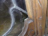 a close up of a metal object on a wooden table