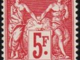 a red and black stamp with a picture of two women on it