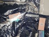 a pile of clothes that are wrapped in plastic