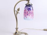 an image of a table lamp with a glass shade on it