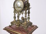 a clock that is sitting on top of a table