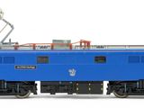 a blue train that is on the tracks on a white background