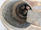 a close up of a metal object with a rusted surface