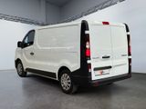 a white van that is parked in a garage