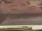 a close up of a painting of a man on a boat