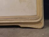 a picture of a mirror that is sitting on the floor