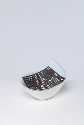 small white bowl with a black and white design on it