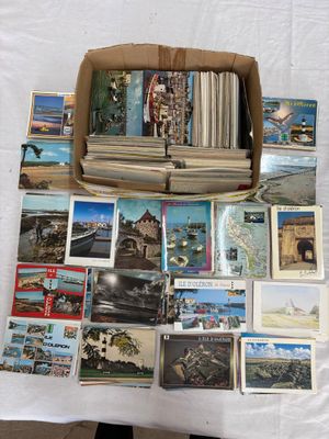 a box full of postcards sitting on a table
