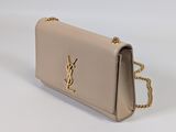 the saint laurent mono bag in beige