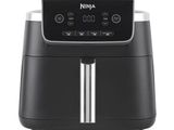 a black and silver air fryer sitting on top of a white surface