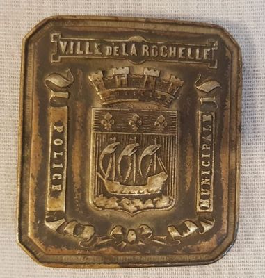 une image représentant une pièce d'or sur laquelle figure un bateau