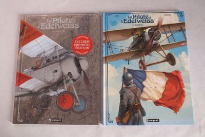 Deux livres sont posés sur une surface blanche ; l'un est un avion et l'autre est un avion.