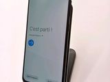 an image of a cell phone sitting on top of a stand