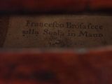 an image of a close up of a shoe with a label on it
