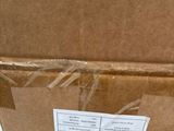 a brown box with a label on it sitting on a table
