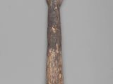 a wooden spoon and a wooden spoon on a table