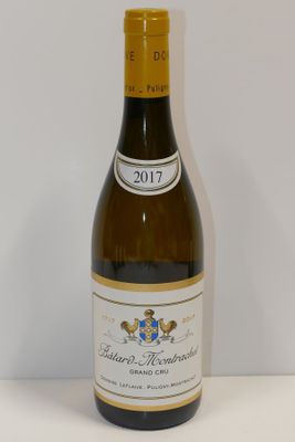 a bottle of wine that is sitting on a table