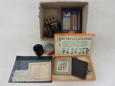 a box with a game set in it on a table