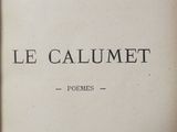 an old book with a black and white image of the title