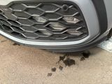a close up of the front bumper of a car