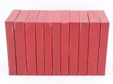six red books stacked on top of each other
