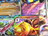 a lot of pokemon cards on display in a store