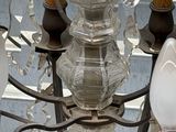 a chandelier that has a lot of glass on it