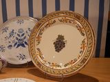 two plates that are sitting on a table