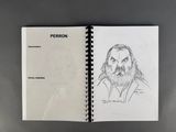 an open notebook with a drawing of a bearded man on it