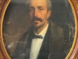 portrait of a man in a tuxedo with a bow tie
