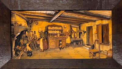 a picture of a painting of a kitchen in a wooden frame