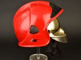 a helmet on a stand with a helmet on top of it