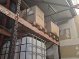 a large white container sitting on top of a pallet in a warehouse