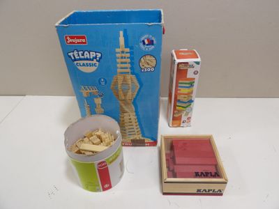 a box of legos and a cup of cereal on a table