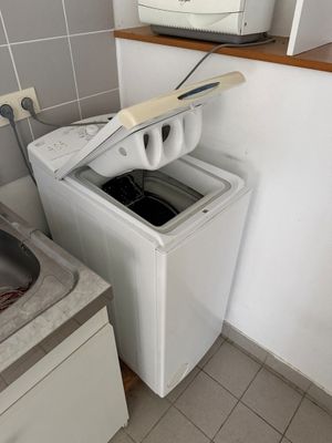 a washer and a dryer in a small kitchen