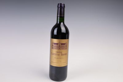a bottle of wine that is sitting on a table