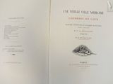 un livre ouvert sur lequel figure l'image d'une souris