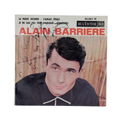 the cover of a magazine with a picture of a man in a black shirt