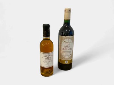 two bottles of wine sitting next to each other on a white surface