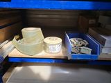 a shelf that has a lot of items on it