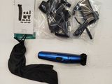 a hair dryer, blow dryer, and other items on a table