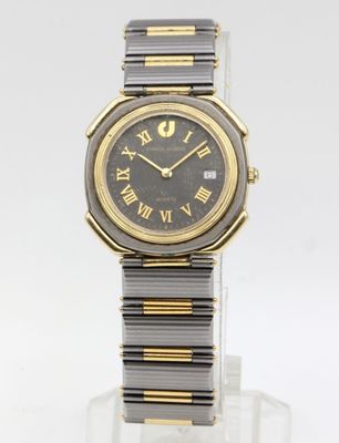 CHARLES JORDAN. Montre homme en acier gris et plaqué or.
