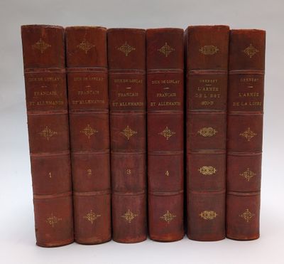 un lot de cinq livres anciens ornés de lettrages dorés