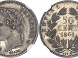 a silver coin with an image of a woman on it